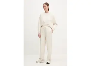 Παντελόνι φόρμας Puma χρώμα: μπεζ, 629774